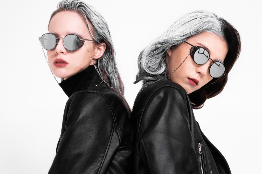 Close-up of a faux leather oversized jacket with a zip-up closure and ribbed cuffs, perfect for layering in fall.