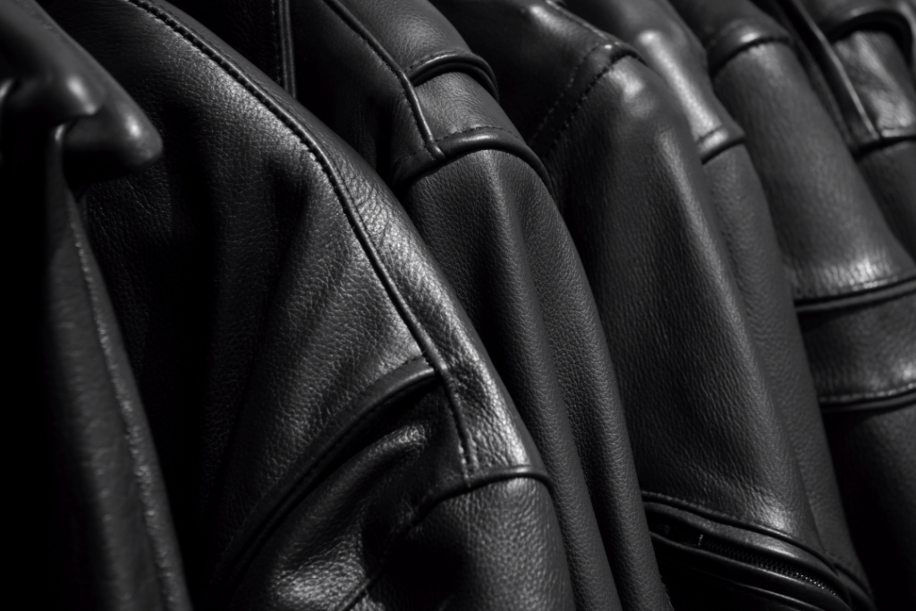 Oversized faux leather jacket displayed on a hanger, showcasing its soft texture and roomy fit, ideal for colder weather.